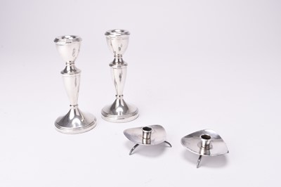 Lot 32 - Two pairs of candlesticks