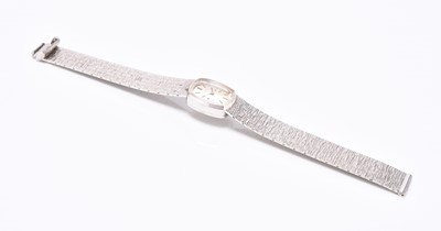Lot 66 - IWC: A lady's 18ct white gold bracelet watch