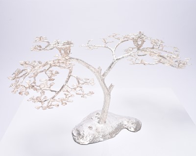 Lot 14 - A Patrick Mavros silver 'Fari' Acacia tree candle holder / table ornament