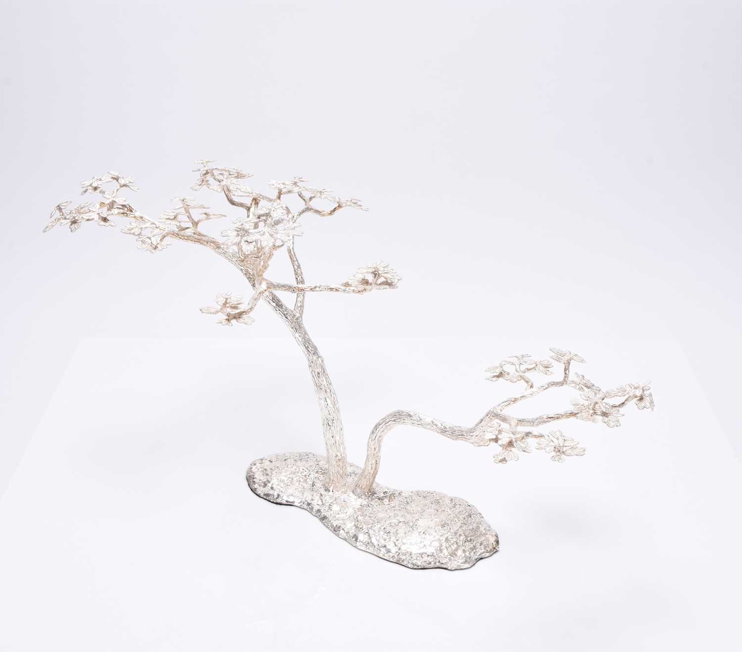 Lot 13 - A Patrick Mavros silver 'Fari' Acacia tree candle holder / table ornament