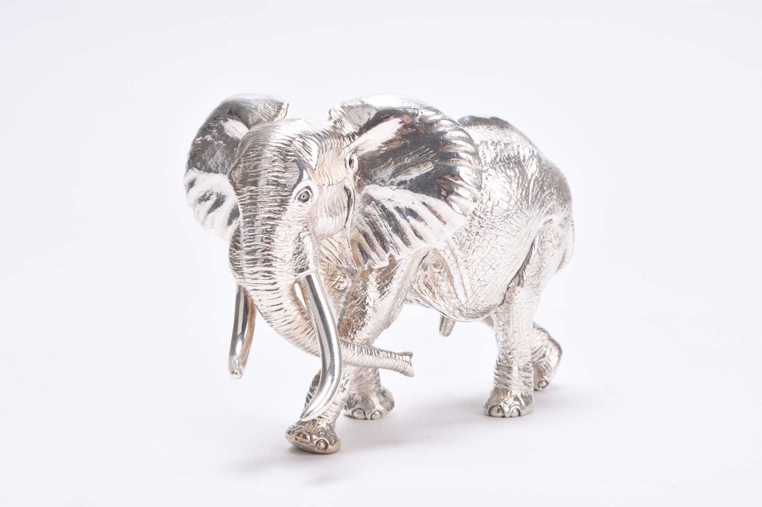 Lot 15 - A Patrick Mavros silver model of an elephant; JOAO