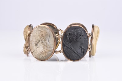 Lot 197 - A late 19th century lava cameo bracelet