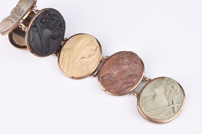 Lot 197 - A late 19th century lava cameo bracelet