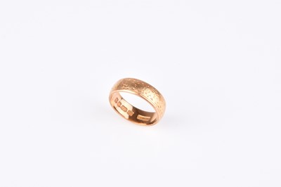 Lot 110 - A 22ct gold wedding band