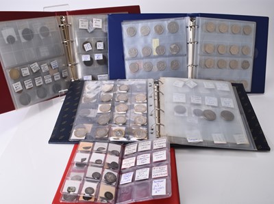 Lot 303 - Four albums of UK and foreign silver, cupro-nickel, copper and bronze coinage