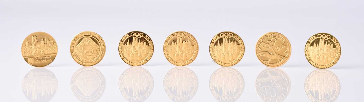 Lot 154 - Germany - 24ct gold 7 medalets commemorating 1972 summer and winter Olympic games in Munich and Sapporo