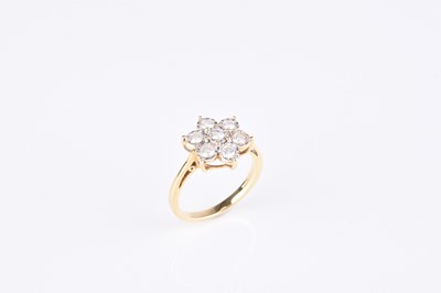 Lot 256 - An 18ct gold brilliant cut diamond floral cluster ring