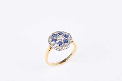 Lot 207 - A sapphire and diamond cluster ring