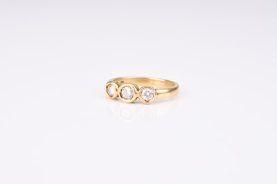 Lot 83 - A graduated three stone diamond ring