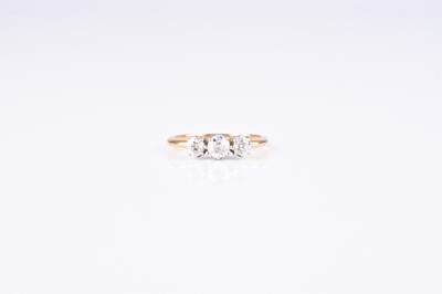 Lot 126 - A graduated three stone diamond ring