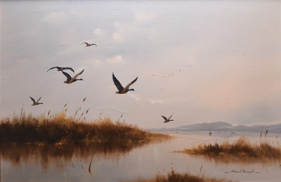 Lot 62 - Howard Devonald (b.1944), Brent Geese in flight over Marshland