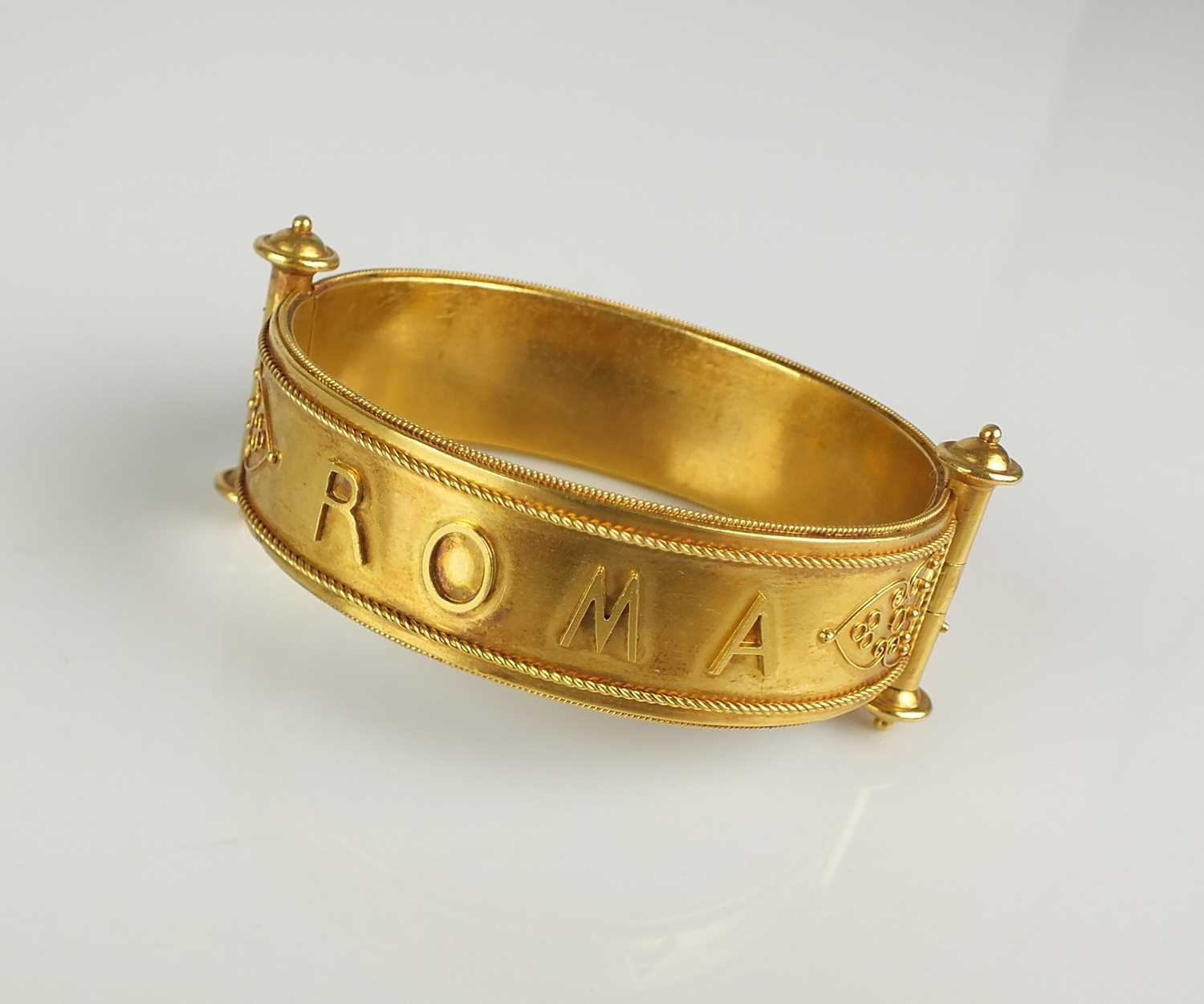 Lot 59 - A mid-19th century Grand Tour hinged bangle
