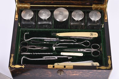 Lot 22 - An S Mordan Victorian silver mounted travelling dressing table set