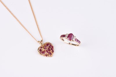 Lot 136 - A 9ct gold heart shaped ruby set pendant on chain and a ruby ring