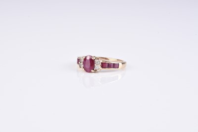 Lot 136 - A 9ct gold heart shaped ruby set pendant on chain and a ruby ring