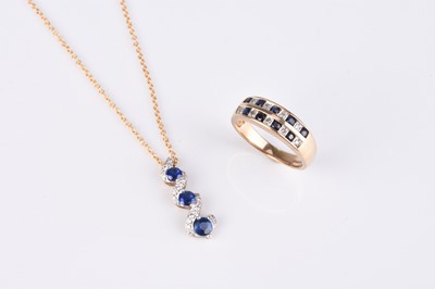 Lot 247 - A 9ct gold sapphire and diamond pendant on chain and a ring