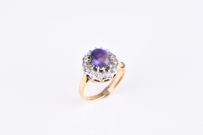 Lot 174 - An 18ct gold opal and diamond cluster ring