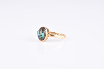 Lot 138 - An early 20th century 18ct gold boulder opal ring