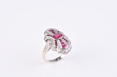 Lot 133 - An Art Deco style ruby and diamond cluster ring