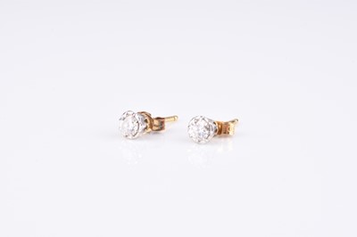 Lot 215 - A pair of diamond stud earrings