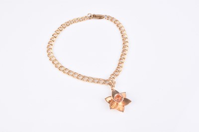 Lot 157 - A Clogau 9ct gold Daffodil charm bracelet