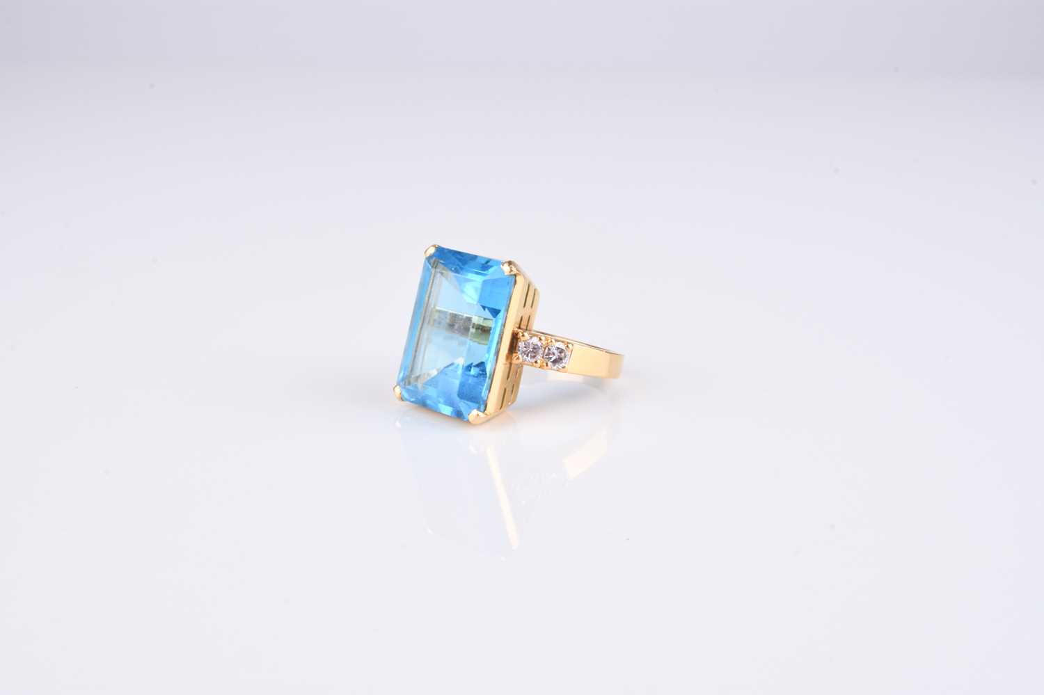 Lot 194 - A large blue topaz and diamond ring
