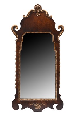 Lot 294 - A reproduction mahogany fret type wall mirror