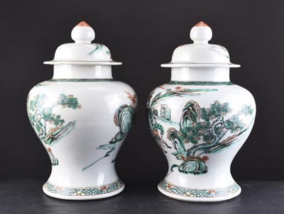Lot 72 - A pair of Chinese famille verte vases and covers, 19th century