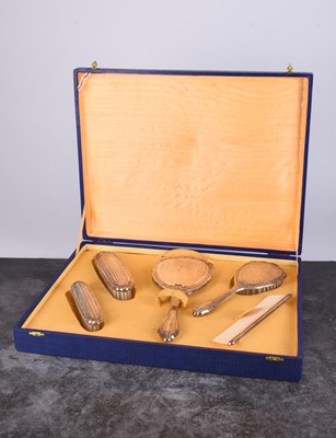 Lot 35 - A cased white metal mounted dressing table set