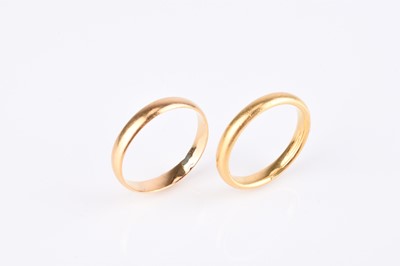 Lot 173 - Two 22ct gold polished wedding bands