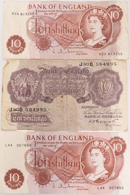 Lot 273 - Three Bank of England white five pound notes, London 23 January 1952, signed by P.S Beale