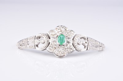 Lot 125 - An emerald and diamond bracelet