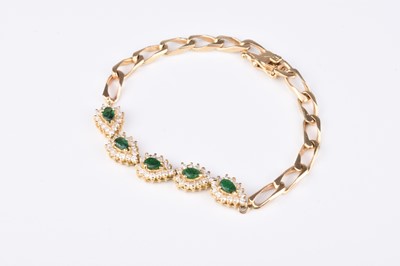 Lot 69 - A diamond and emerald bracelet