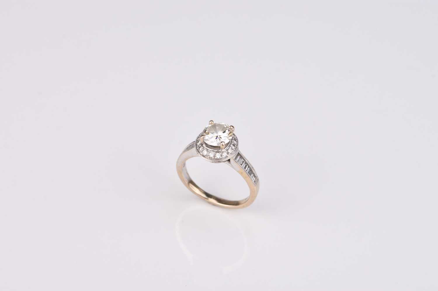 Lot 334 - A brilliant cut diamond halo ring