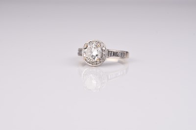 Lot 334 - A brilliant cut diamond halo ring