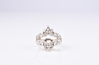 Lot 187 - A diamond set double herringbone ring