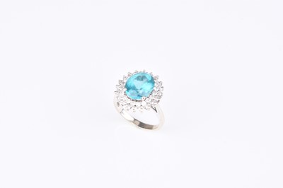 Lot 109 - A blue apatite and diamond cluster ring