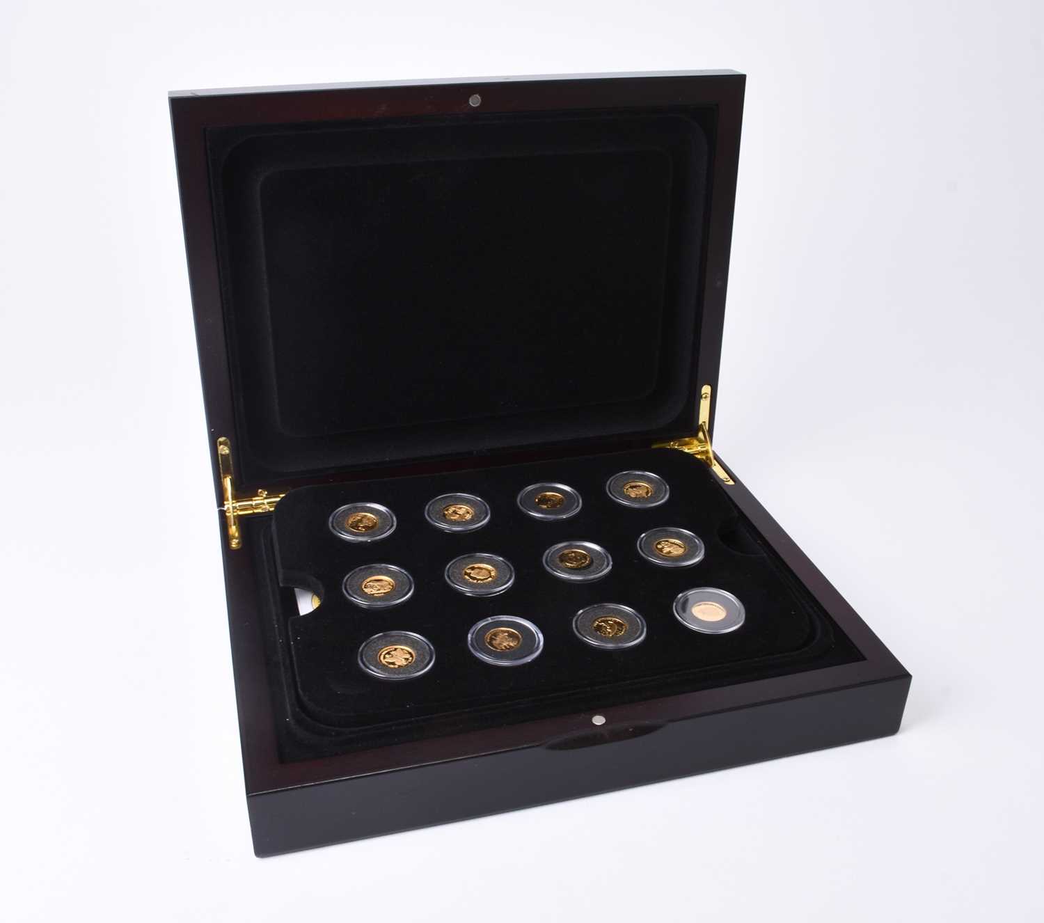 Lot 194 - UK Royal Mint. A cased set of twelve 24 ct gold foreign coins