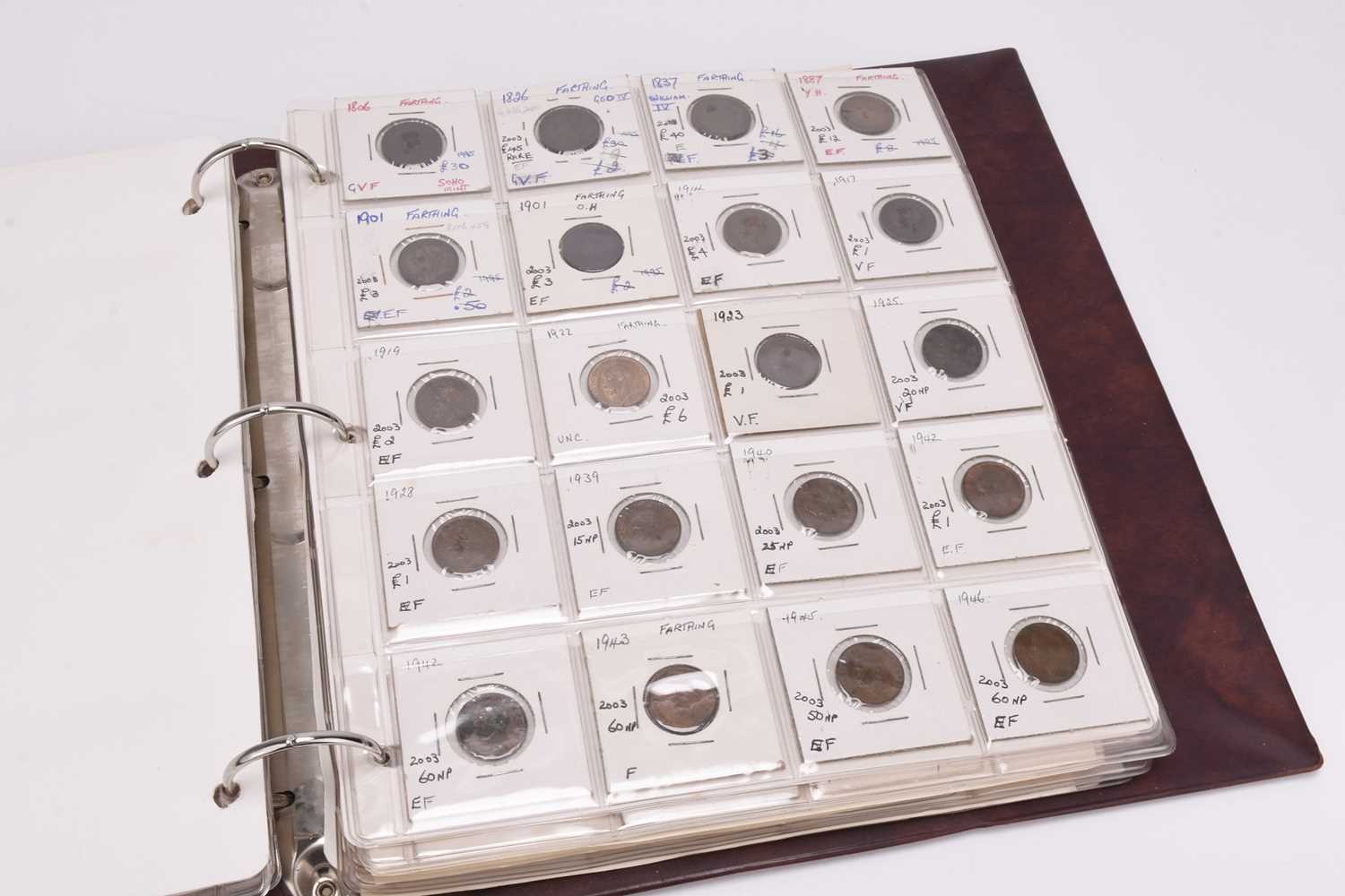 Lot 213 - A red coin album containing large collection of UK and USA