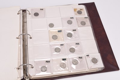 Lot 213 - A red coin album containing large collection of UK and USA