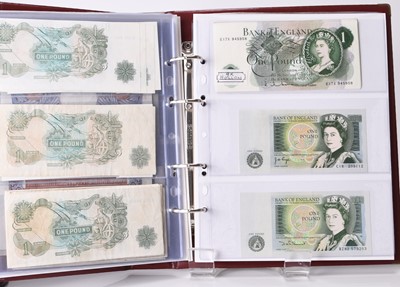 Lot 320 - An album containing 103 UK banknotes comprising