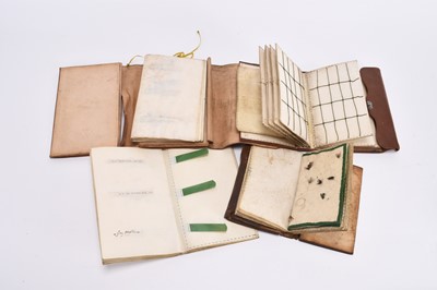 Lot 130 - A group of late 19th century and later fishing wallets with flies