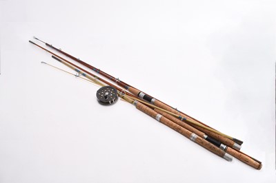 Lot 129 - Two vintage cane fly rods, a vintage glass fibre rod and a Shakespeare reel