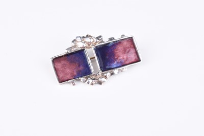 Lot 167 - A Norman Grant silver and enamel brooch