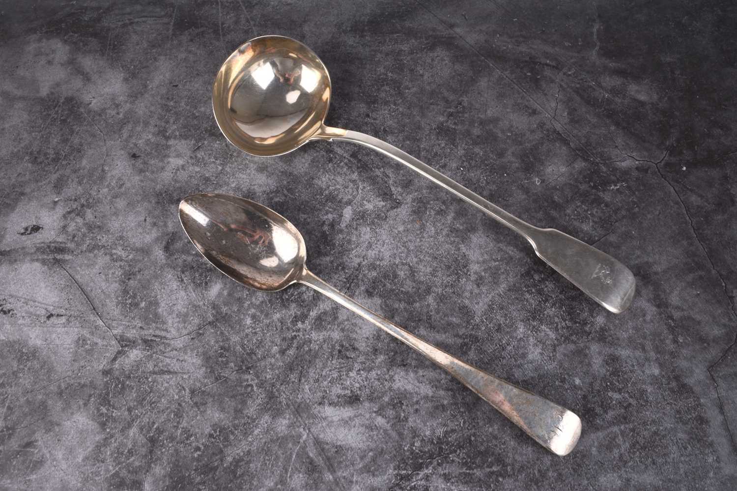 Lot 19 - A silver basting spoon and soup ladle