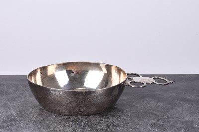 Lot 23 - A silver porringer