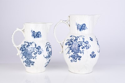 Lot 14 - Two Caughley 'Bouquets' cabbage leaf maskhead jugs, circa 1785