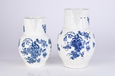 Lot 14 - Two Caughley 'Bouquets' cabbage leaf maskhead jugs, circa 1785