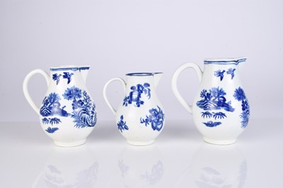 Lot 457 - Two Worcester 'Fence' sparrow beak cream jugs, circa 1775-80 and one 'Fruit Sprigs' jug
