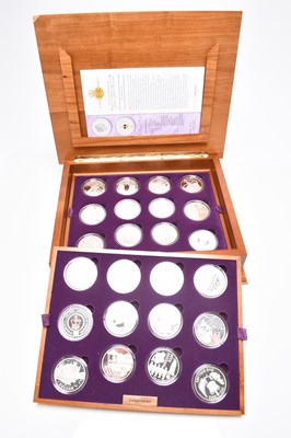 Lot 115 - A cased set of Elizabeth II crown size silver proof. twenty four coins commemorating The Queen's Silver Jubilee